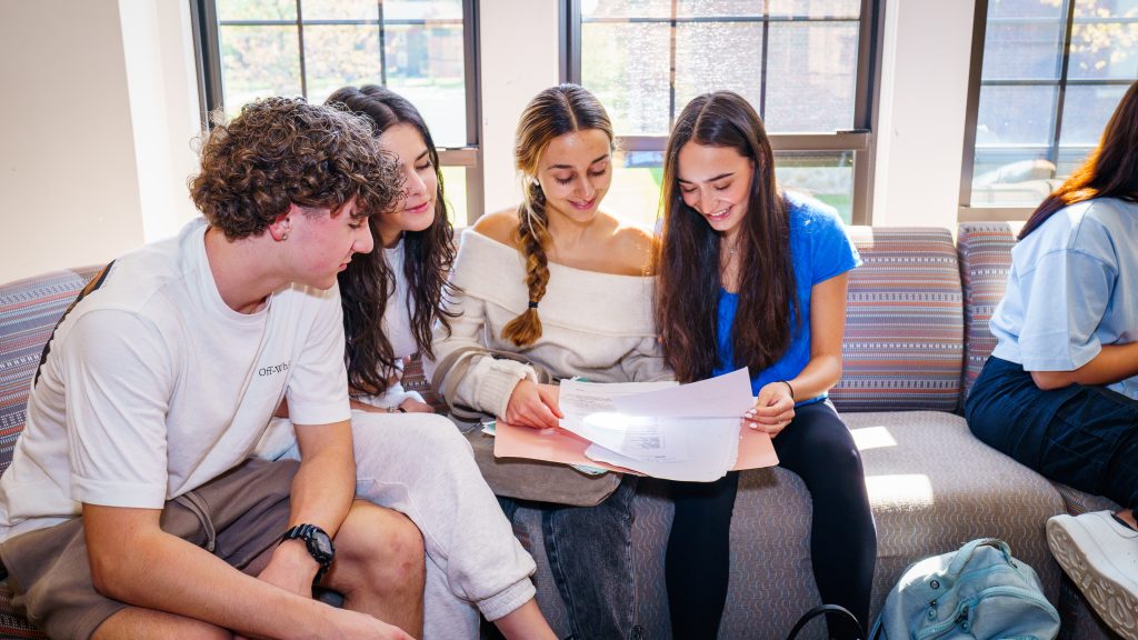 group of students sitting on couch